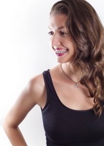 Woman with tank top and braces